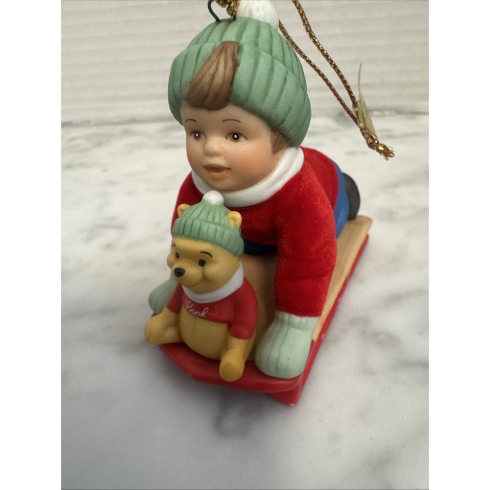 Disney Ashton Drake ornament Hold on Pooh sled ceramic and felt boy sledding